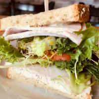 Dancer Sandwich · Turkey breast deli cut, lettuce, diced tomatoes, alfalfa sprouts, and avocado with garlic ma...