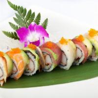 Rainbow Roll · California roll inside, tuna, salmon and white fish on top.