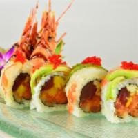 Passionate Roll 热情卷 · Salmon, spicy tuna, mango inside, sweet shrimp, avocado, tobiko on top in special sauce.