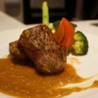 Japanese Curry Steak 日式咖喱牛排 · 8 oz. Steak served with special curry sauce. Served with miso soup or garden salad and rice.