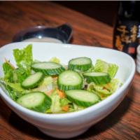 House Green Salad · Spring mix, romaine lettuce, cucumber cherry tomato with miso gralic dressing.