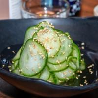 Cucumber Salad · Thin sliced fresh cucumber in a sweet vinegar sauce.