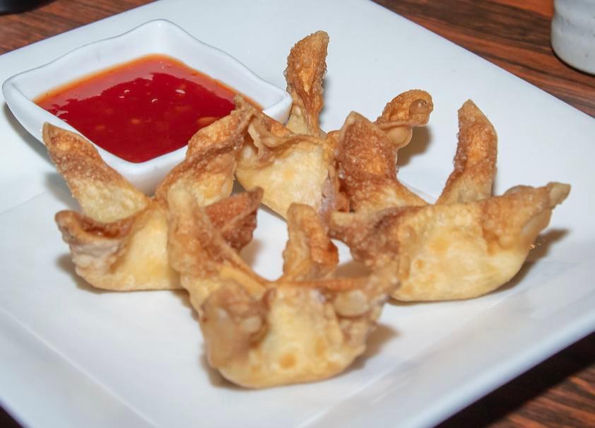 Crab Rangoons · Deep fried imitation crab meat with cream cheese wrapped in wonton skin.