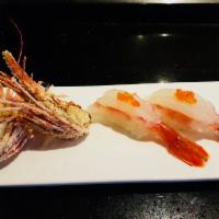Amaebi Nigiri · Raw sweet shrimp with deep fried shrimp heads.