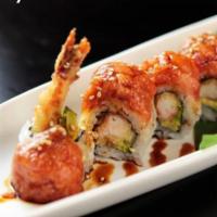 Crazy Roll · Shrimp tempura, avocado, spicy tuna, sesame seeds, sushi rice, unagi sauce, paper.