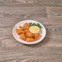 Macaroni Nuggets · 8 pieces of fried mac and cheese served with our homemade honey mustard.