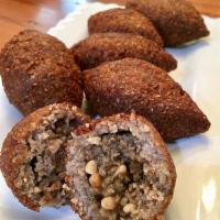 3 Fried Kibbeh · Sauteed onions, ground beef, pine nuts, salt, herbs and spices stuffed into raw kibbeh and d...