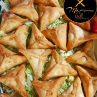 3 Piece Fatayer · Our special spinach filling spread onto dough and baked