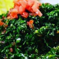Tabouli Salad · Finely chopped mint, parsley, green onion and diced tomatoes combined with cracked wheat, le...