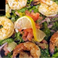 Jumbo Grilled Shrimp · Marinated jumbo shrimp, charbroiled and lightly seasoned with our special spice blend.