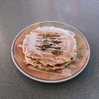 Cinna Bomb Pancakes · Buttermilk pancakes filled with a cinnamon roll brown sugar swirl topped with cream cheese f...