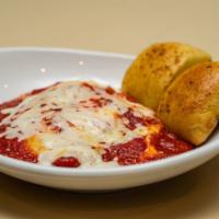 Cheese Ravioli · Ravioli filled with Ricotta, Mozzarella, and Parmesan Topped with Marinara and Mozzarella Ch...