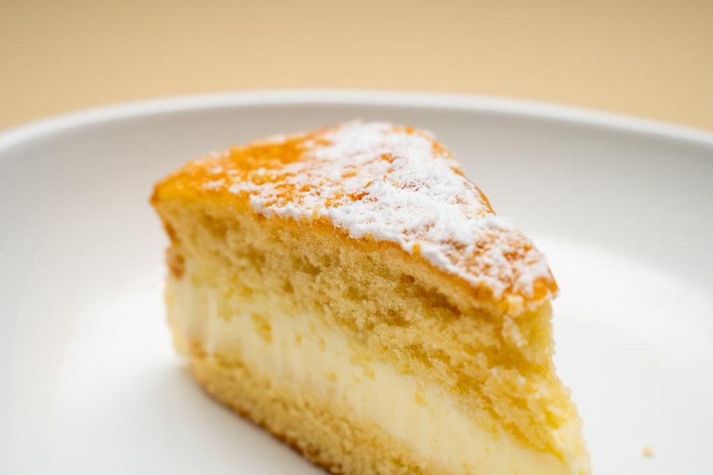 Limoncello · Fluffy cake infused with lemon and topped with lemon marscapone frosting.