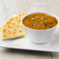 Mediterranean Lentil Soup · With green lentils, vegetables, ancient grains, and served with warm pita.