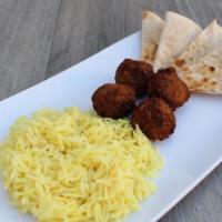 Kid's Meal with Crispy Chickpea Falafel · Vegan.
All kids meals served with seasoned basmati rice, and warm pita.
