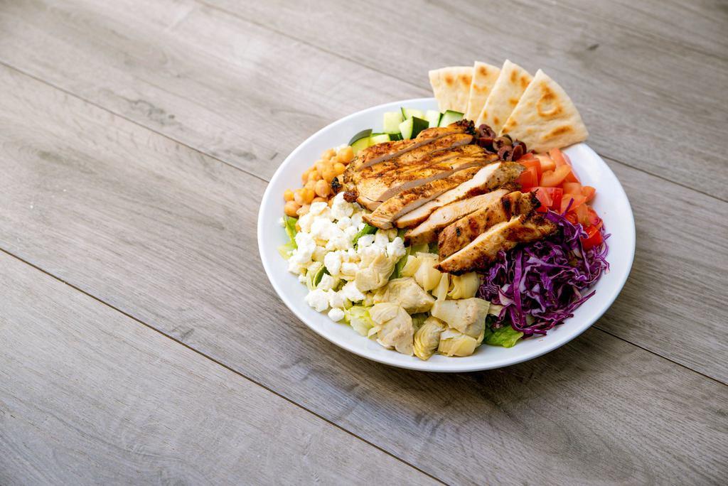 Mediterranean Salad · Mixed greens tossed with lemon tahini dressing, chickpeas, artichokes, tomatoes, cucumbers, red cabbage, feta, Kalamata olives and grilled chicken.