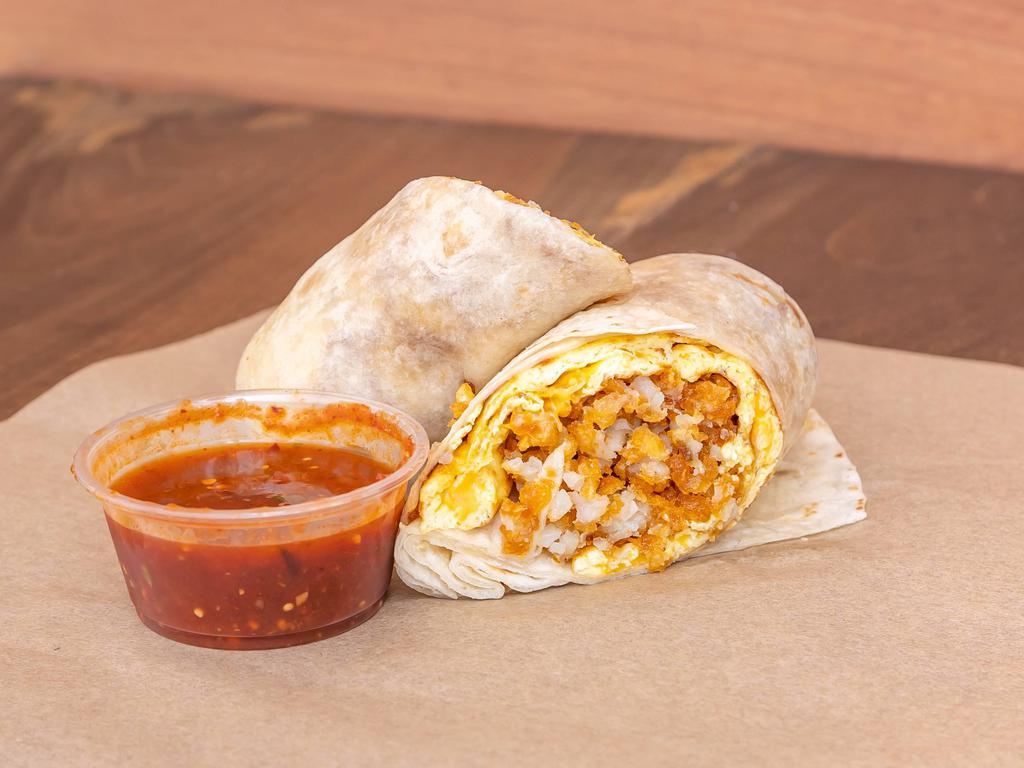 Nick's Breakfast Burrito · 2 eggs, smashed potatoes with cheddar cheese with chile de arbol salsa on the side.