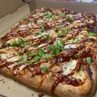 BBQ Chicken Pizza  · Topped with BBQ sauce, grilled chicken breast, mozzarella cheese, red onion, and cilantro. 