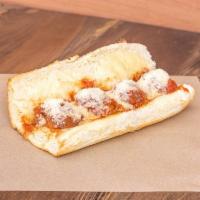 Nonna's Meatball Sub · A family meatball recipe made fresh with beef, pork, and spices in Riera's marinara with mel...