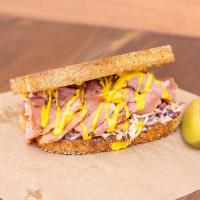 Cold Pastrami Sub · Thinly sliced house pastrami and coleslaw tossed in Russain dressing, and choice of mustard....