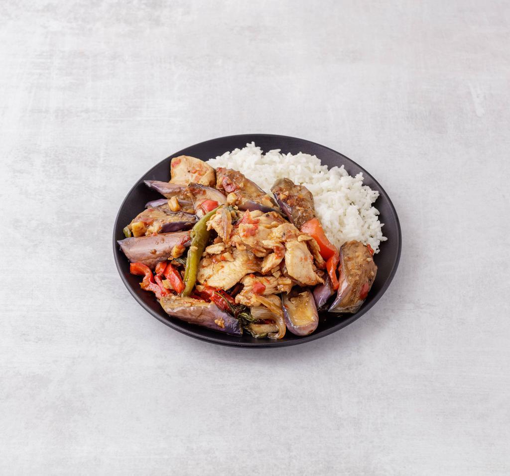 Pad Eggplant · Sauteed eggplant, onion green hot pepper and red bell pepper with light basil sauce.