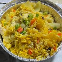 34. Pineapple Fried Rice · Fried yellow rice with your choice of meat, egg, pineapple, scallions, onions, cashew nuts, ...