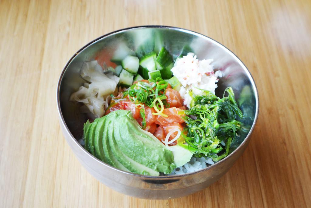 Yuzu Salmon Poke · Yuzu chili, wakame, cucumber, crab salad, avocado, and sushi rice or greens.