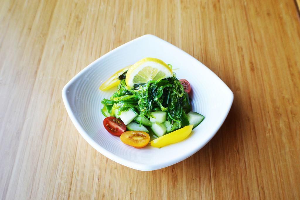 Wakame Salad · Cucumber, tomato and sweet vinegar. Gluten free and vegan.