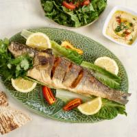 Fresh Mediterranean Fish · Served with lemon, toast bread, salad or rice or fries. Served with rice, hummus, salad and ...