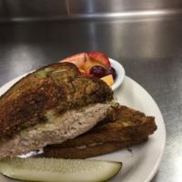 Tuna Melt Sandwich · Premium white tuna salad served on grilled marble rye with melted Swiss cheese. Served with ...