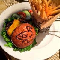 Peabody Burger · 8 oz. Black Angus beef patty, garlic aioli, cheddar cheese, tomato, Jack Daniel's pickles, l...