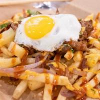 Nom Fries · Our version of loaded fries, comes with fries, grilled onions, pineapples, your choice of pr...