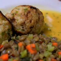 Crab Cakes · 95% crab meat served over lentil relish with an orange tarragon beurre blanc.