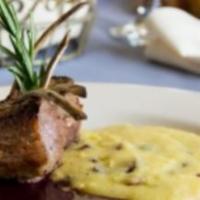 New Zealand Rack of Lamb · Served in a port wine reduction served with roasted lemon potatoes.