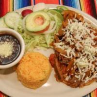 Bistek a la Mexicana Platillo · Sautéed stake with onions, tomatoes, jalapeños, served with rice and beans, a small side sal...