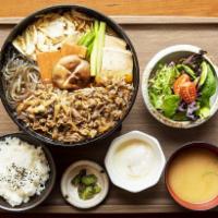Washu Beef Sukiyaki Bento Box · Sliced beef, tofu, vegetables, scallion, glass noodle, sesame seeds and side of poached egg....