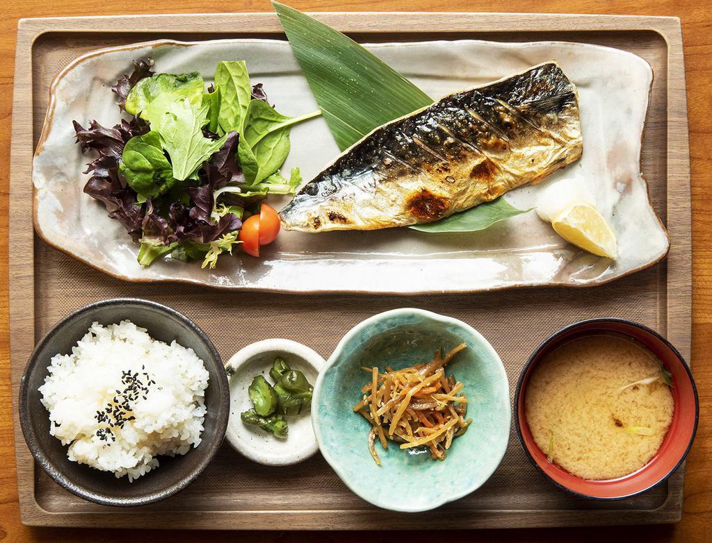 Saba Shioyaki Bento Box · Grilled mackerel, shredded cabbage and side of ponzu with grated daikon radish.