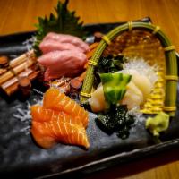 3 Kind Sashimi · 3 pieces each of Blue Fin Tuna, Scottish Salmon, Hamachi.