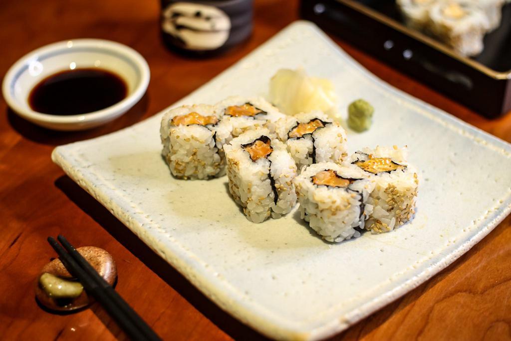 Spicy Salmon Roll · Salmon with spicy mayo and tobiko.