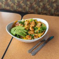 Mango-Avocado Shrimp Salad · Freshly diced mangos, pico de gallo, chopped avocado, tortilla crumbles, and lime vinaigrett...