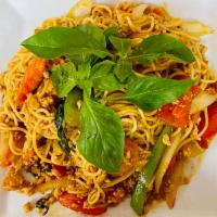 31. Pad Kee Mow Spaghetti · Flat noodles, basil tomatoes, yellow onion, bell pepper and egg.