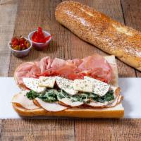 The Junk Yard Special Sammie · Star of the real Philly Deli magazine: 98% fat-free turkey, prosciutto, sauteed spinach, roa...