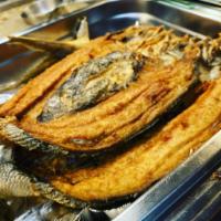 Daing na Bangus Fried · Milkfish ( Bangus ) marinated in vinegar, garlic and salt. Deep fried until golden brown.