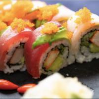 Rainbow Roll · Crabmeat, avocado, cucumber inside, salmon, tuna, white fish, avocado and masago on top. Raw.