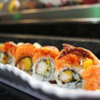 Angel Roll · Shrimp tempura, mango inside. Spicy salmon and crunch on top. Raw. Spicy.