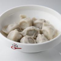 8 Piece Handmade Steamed Dumplings Breakfast 手工水餃 · Filled dough. 