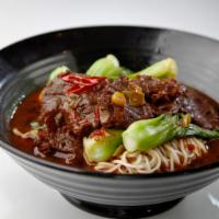 Braised Beef Noodle Soup 紅燒牛肉麵 · Hot and spicy. Lightly browned in fat and then cooked slowly in a closed pan with a small am...