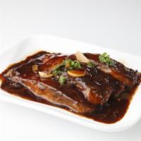 Braised Fish Belly in Brown Sauce 紅燒肚膛 · Lightly browned in fat and then cooked slowly in a closed pan with a small amount of liquid.