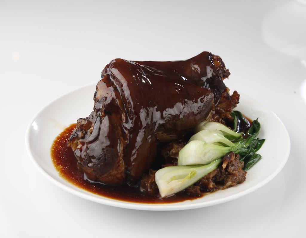 Braised Deep Fried Round Hoof 走油圖蹄 · Lightly browned in fat and then cooked slowly in a closed pan with a small amount of liquid.