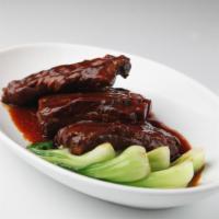 Braised Spare Ribs in Wuxi Style 無錫排骨 · Lightly browned in fat and then cooked slowly in a closed pan with a small amount of liquid.